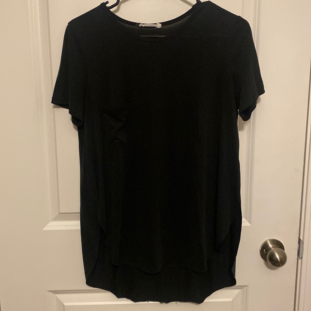 Lush. Black blouse with curved hem. Size Small.